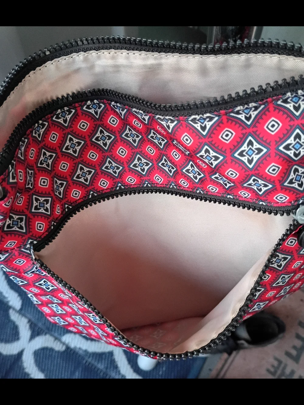 Kipling Jaime crossbody shoulder bag in the red mystical medallion